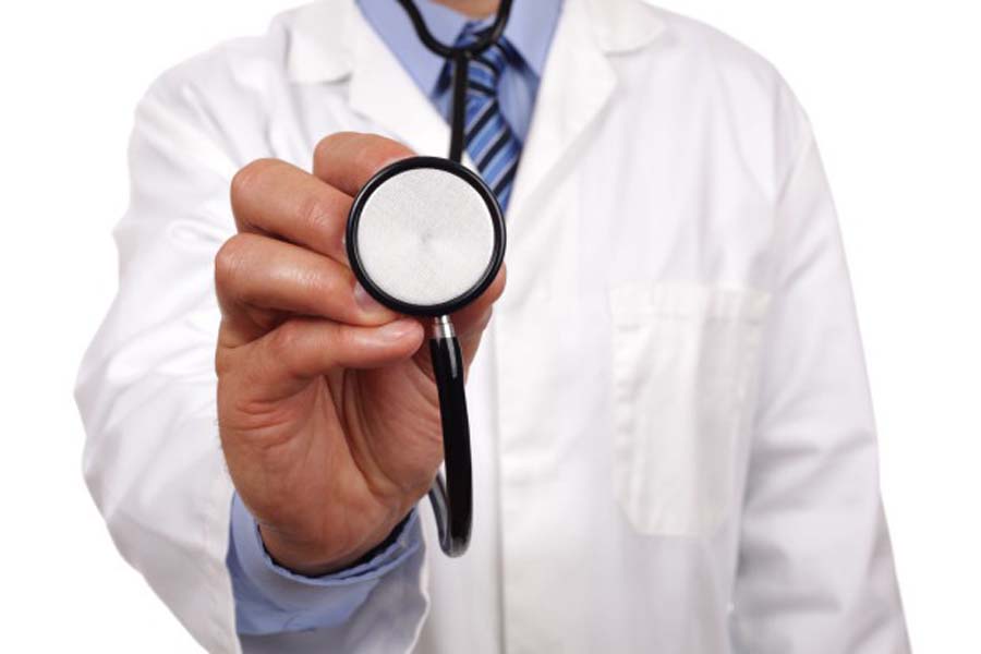Doctor holding stethoscope