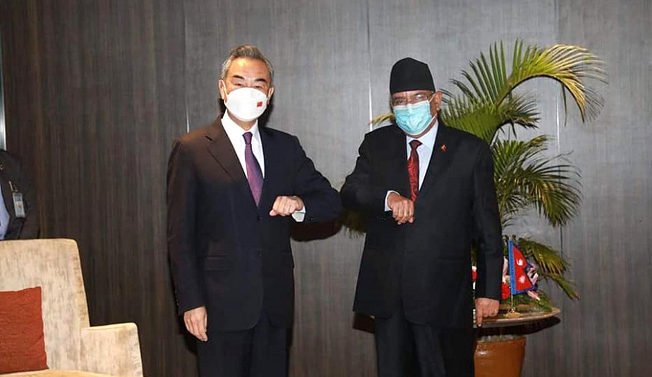 पुष्पकमल दाहाल र वाङ यी