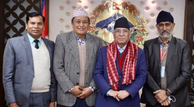 प्रचण्ड र धर्मेन्द्र झा