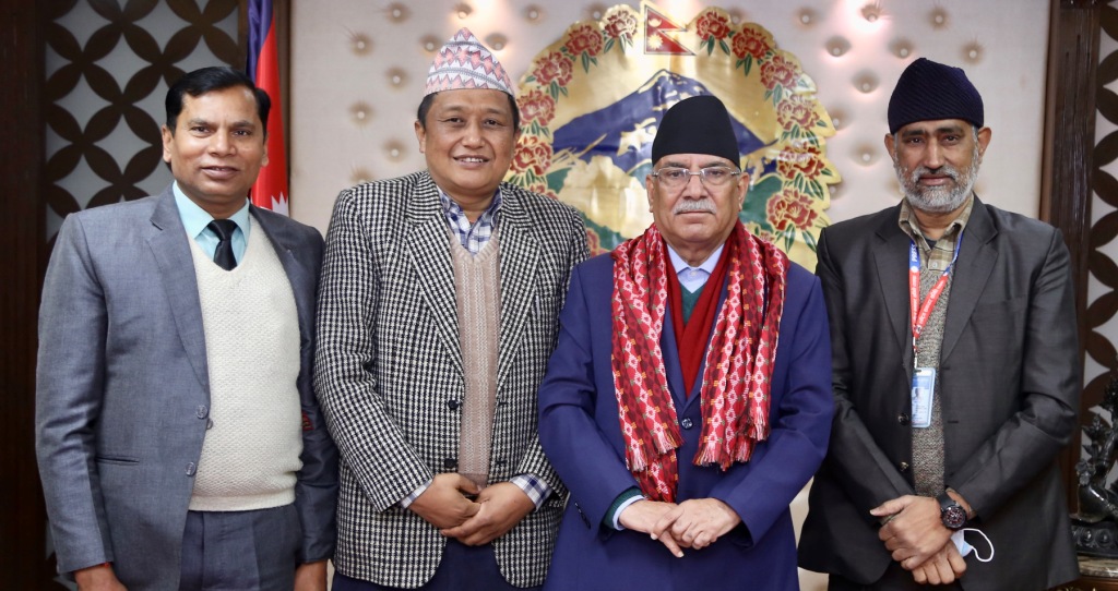 प्रचण्ड र धर्मेन्द्र झा